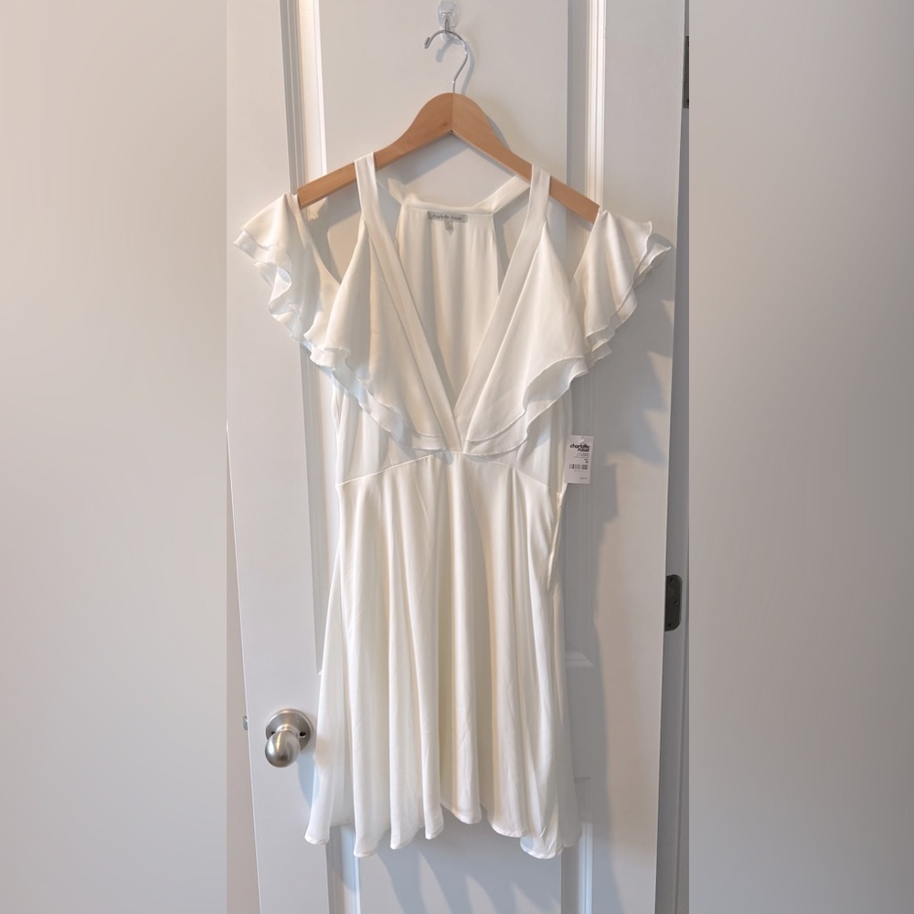 Charlotte Russe white flowey dress. Size medium.